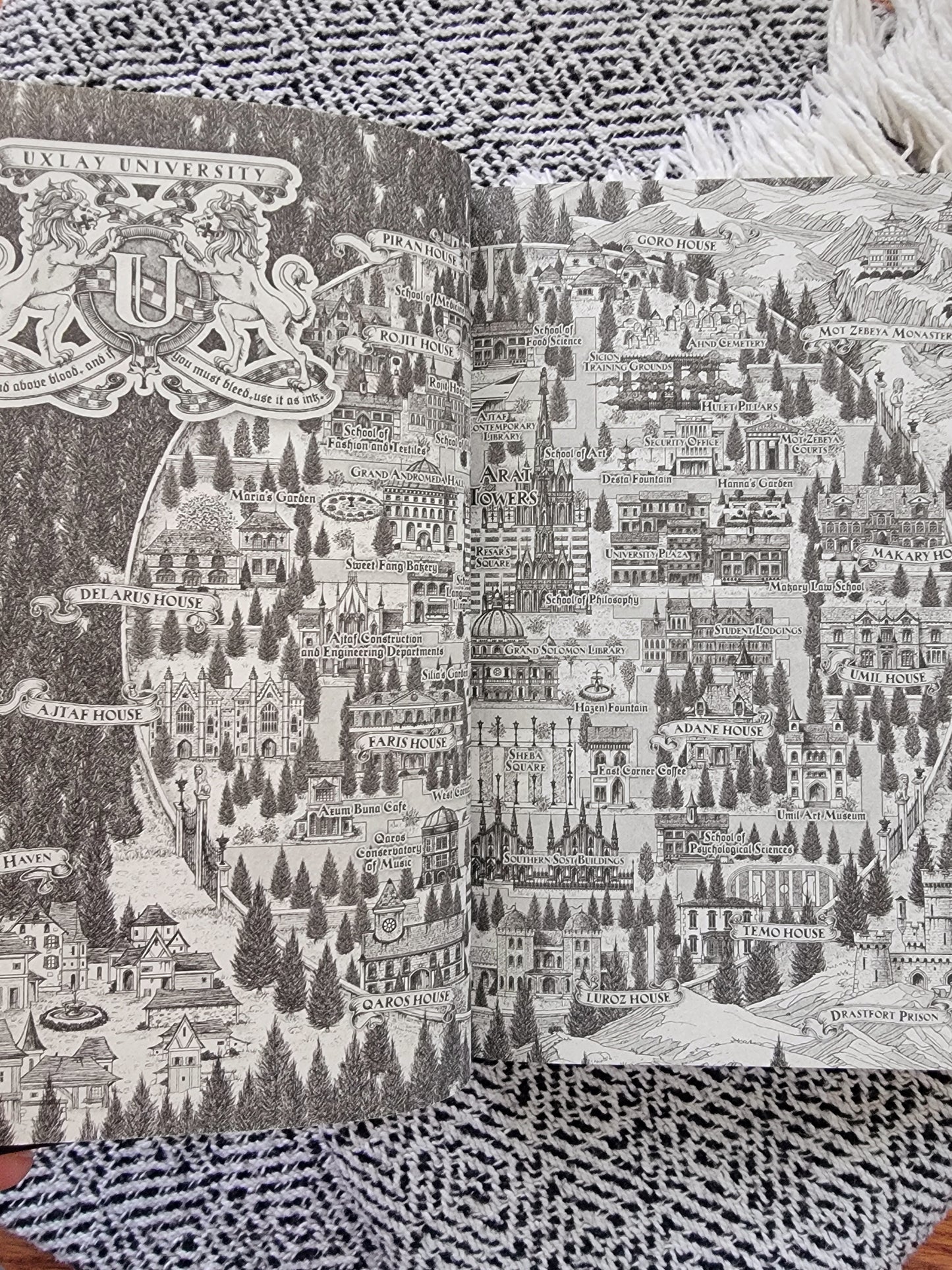 interior of the book immortal dark, a map of uxlay university