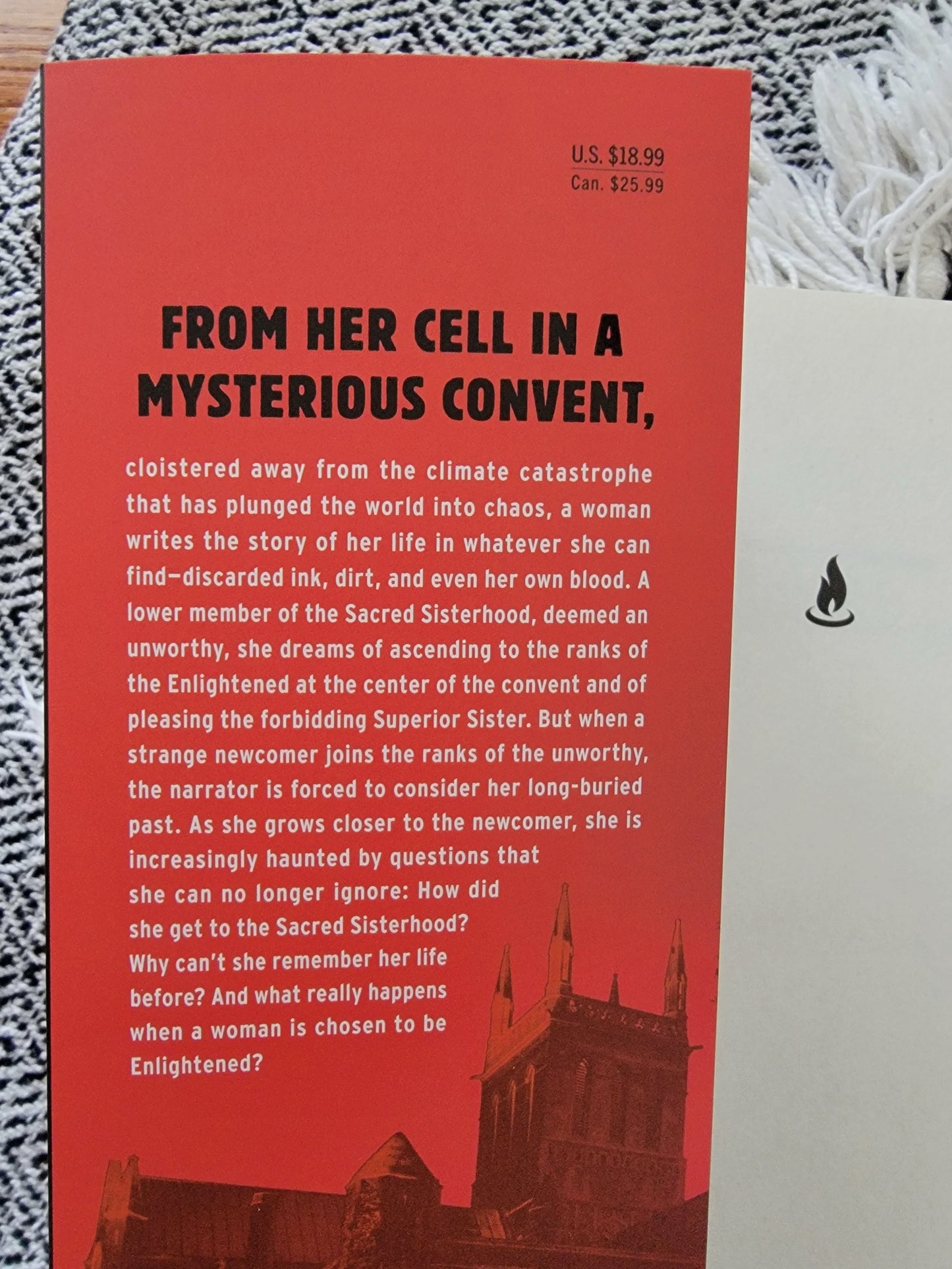 interior cover blurb of "the unworthy" book by agustina bazterrica with price and image of a castle