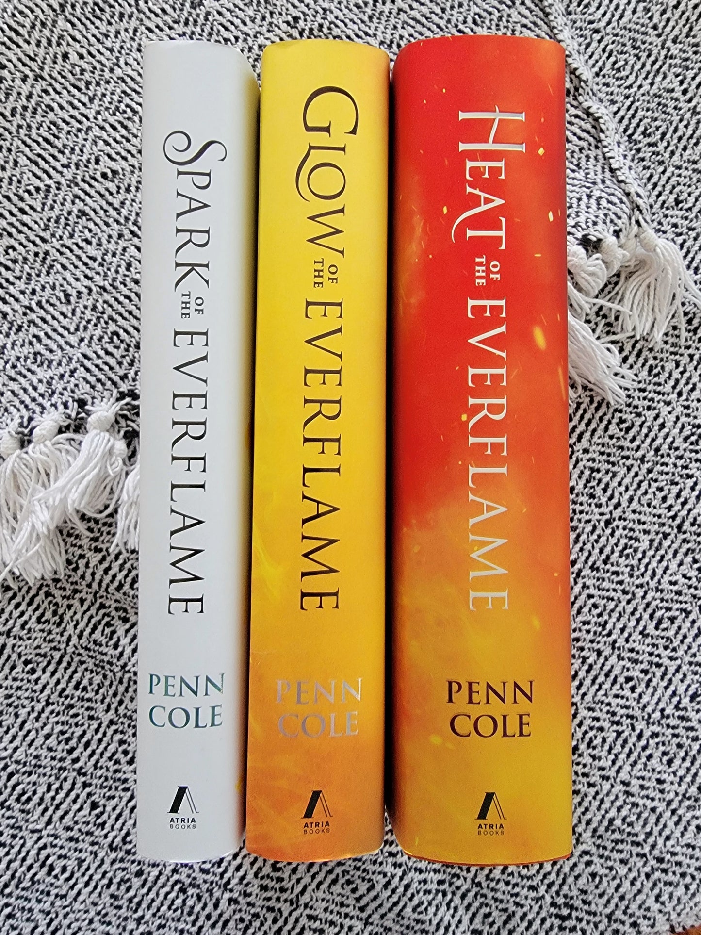 kindred curse saga books 1 through 3 on a soft textured background