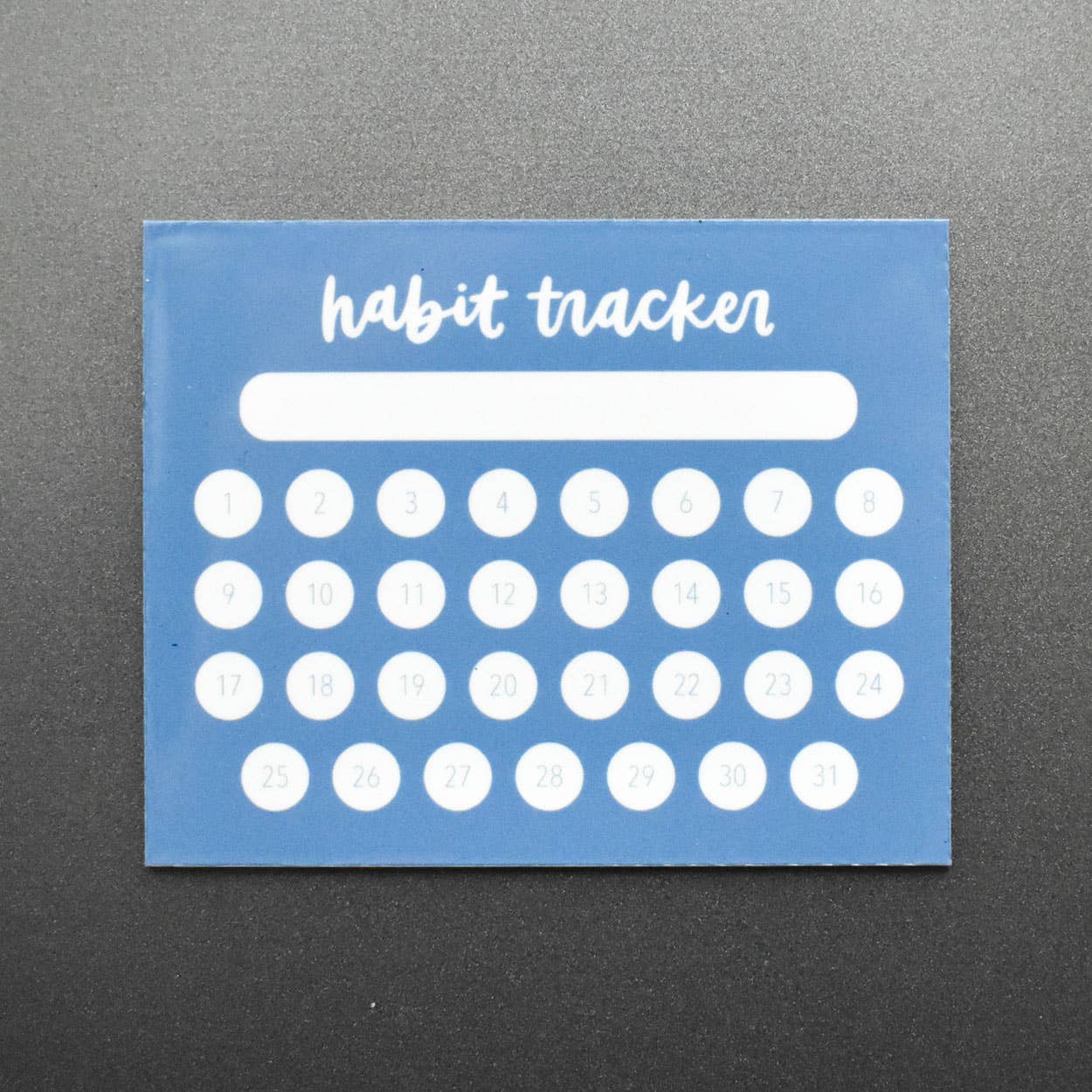 Blue habit tracker with white text and circles on a gray background