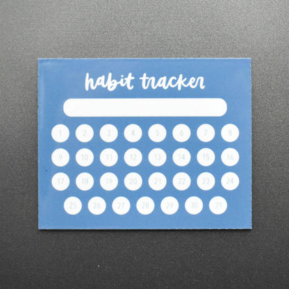 Blue habit tracker with white text and circles on a gray background