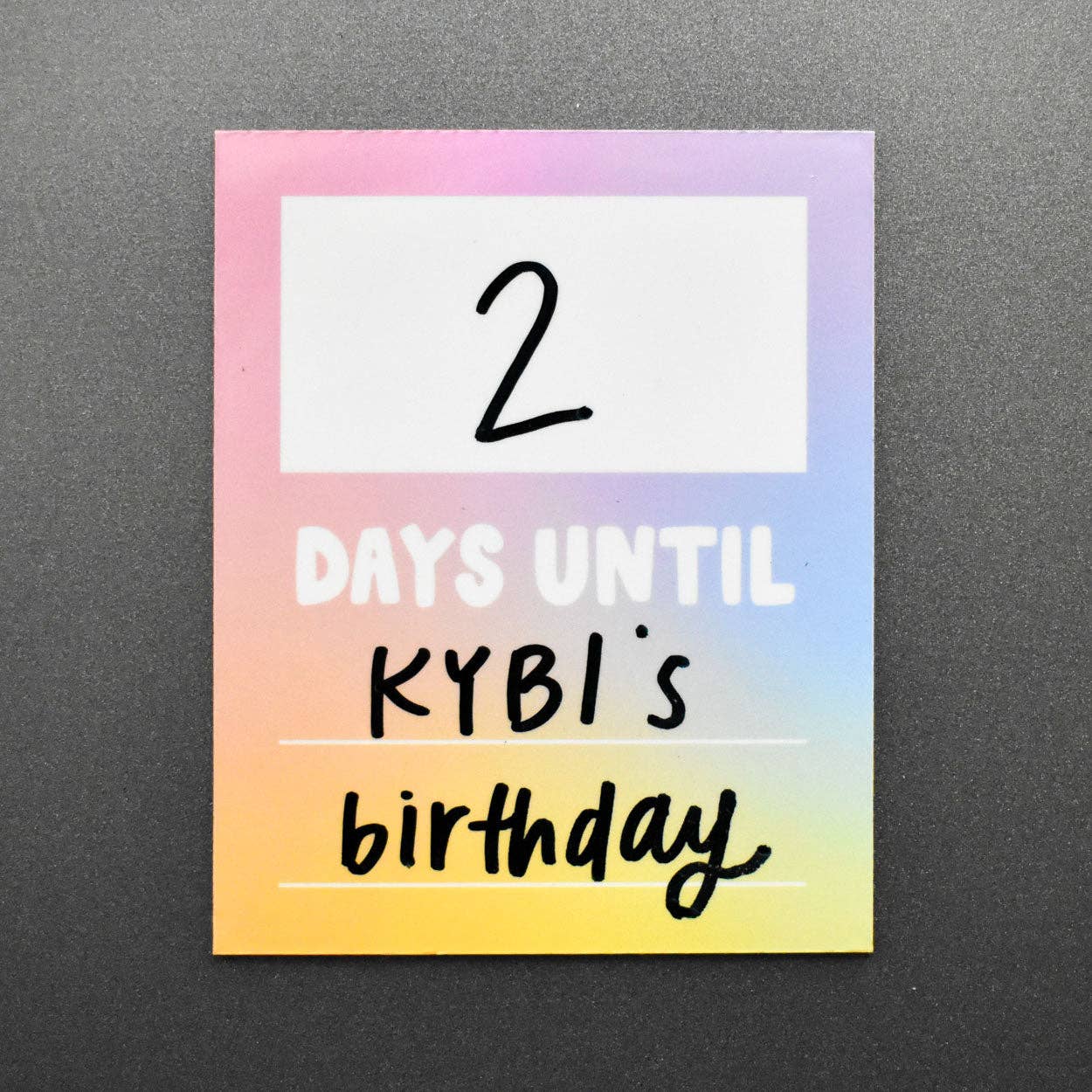 Countdown card with '2 days until KYBI's birthday' on a gradient background