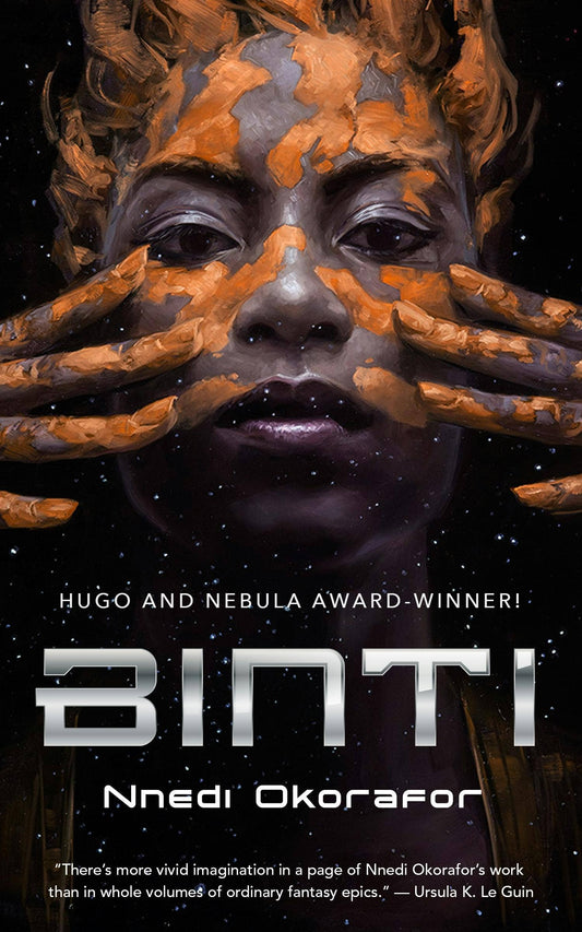 Book cover of 'Binti' by Nnedi Okorafor featuring a woman with clay on her hands and face