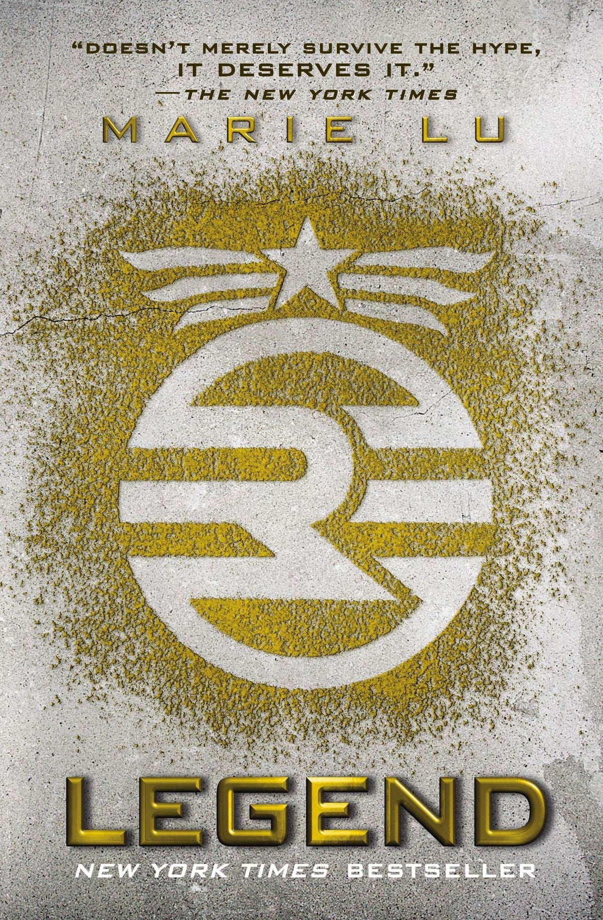Book cover of 'Legend' by Marie Lu with gold emblem and text on a textured background
