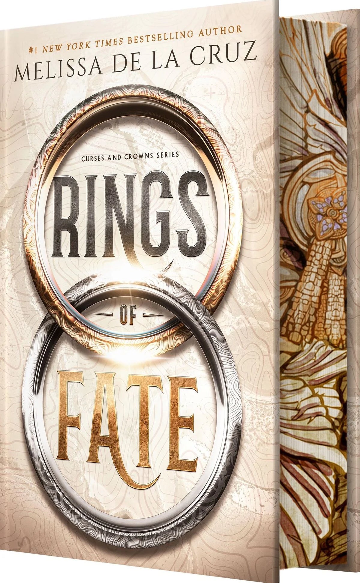 Book cover for 'Rings of Fate' by Melissa de la Cruz, featuring interlocking metallic rings on a parchment-style background with an illustrated winged figure along the spine.
