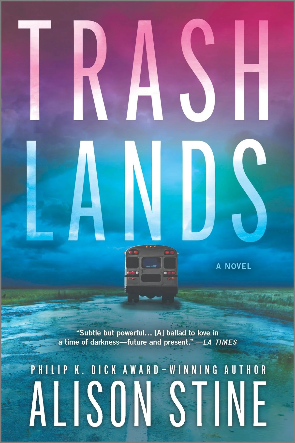 Book cover for the novel 'Trash Lands' by Alison Stine, featuring a purple-to-blue sky with a bus on a road below.